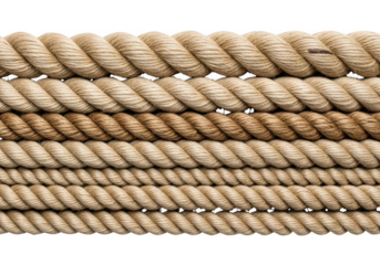 Thick natural fiber rope coiled in layers isolated on transparent background