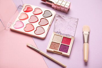 Fototapeta premium Set of cosmetic products on lilac background