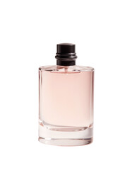 Bottle of perfume sits on a plain surface with a light pink liquid inside during bright lighting