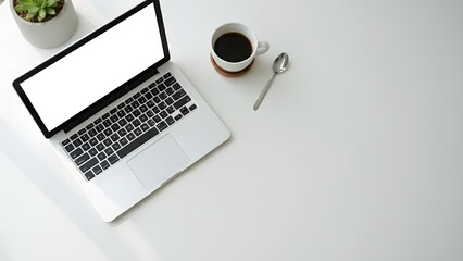 Laptop on White Desk with Coffee Cup.