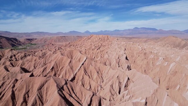 San Pedro de Atacama, Chile: Aerial drone footage of the dramatic rock formations in Devil Throat in San Pedro de Atacama, Chile on sunny day. Taken with orbit motion