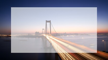 Suspension Bridge at Sunset with Traffic.