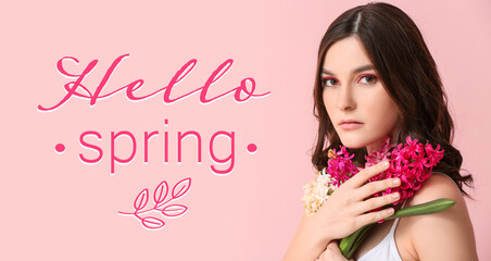 Beautiful young woman with hyacinth flowers on color background