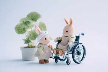 車椅子に乗ったウサギのやさしい福祉イラスト／まみおデザイン福祉シリーズ
