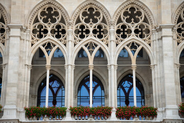 Fototapeta premium Neo-Gothic Arches with Flower Boxes on Vienna City Hall Facade - Austria