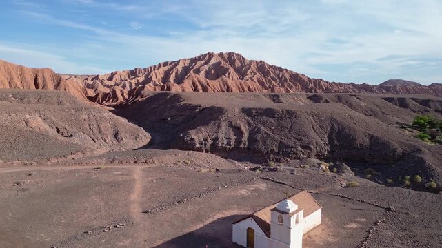 San Pedro de Atacama, Chile: Aerial footage of San Isidro church in the middle of Catarpe valley, San Pedro de Atacama, Chile. Taken with backward motion on sunny day