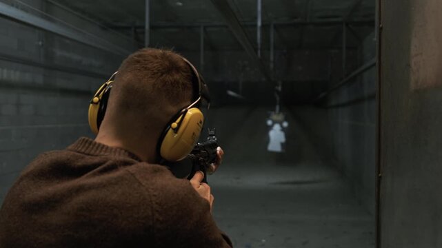 Focused shooter firing an M4 rifle during controlled training. Emphasis on accuracy, discipline, recoil control, and modern tactical practice in a safe, professional range environment.