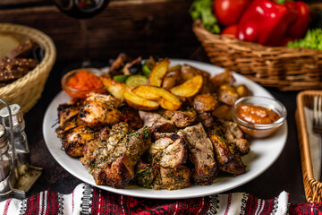 Rustic grilled pork and potato dinner platter