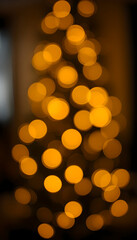golden christmas glow warm yellow defocused bokeh lights