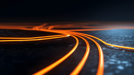 Orange Fiber Optics: Illuminated orange fiber optic cables create dynamic patterns across a textured, dark background, representing digital connectivity and modern technology.