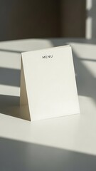Minimalist Tent-Style Menu Card on White Table
