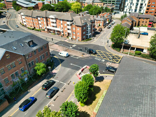 Obraz premium High Angle Street View and Buildings at Central Reading London City and Town Centre. Aerial Drone Tour of England United Kingdom. July 11th, 2025. 