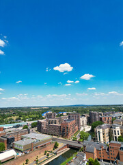 Fototapeta premium High Angle Street View and Buildings at Central Reading London City and Town Centre. Aerial Drone Tour of England United Kingdom. July 11th, 2025. 