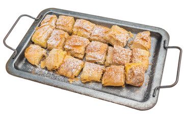 Sweet filo pastry dessert with creamy custard filling dusted with powdered sugar baked and cut into squares top view