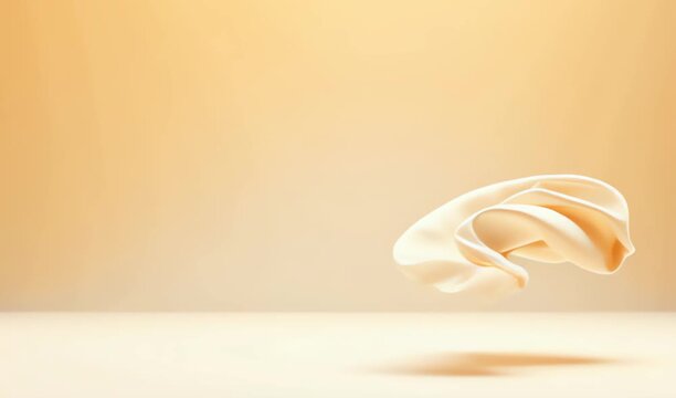 A white feather-like shape drifting on a soft, pale background, evoking lightness and calm 4K HD Video