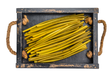Pickled ramsons stems in wooden container top view traditional homemade wild garlic preserve isolated