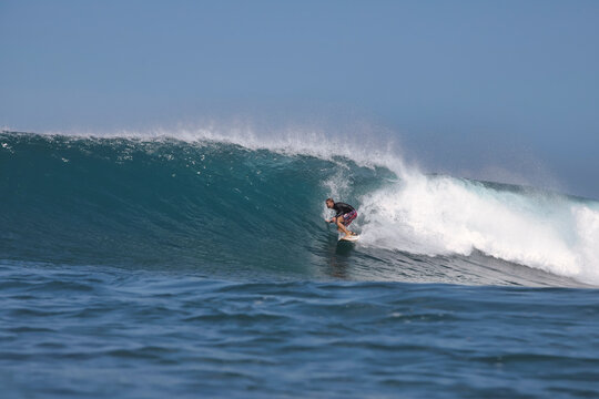 Surfing Intense Wave, Single Rider Maneuvers Through Cresting Wave