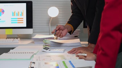 Business colleagues analyzing financial charts and data - Powered by Adobe