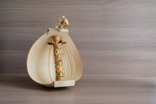 Traditional Sasando musical instrument from Asia displayed on a neutral background Perfect for cultural education, traditional music, heritage content, and Southeast Asian culture concepts