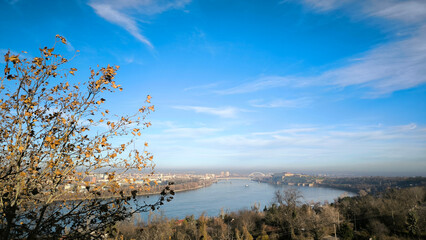 landscape by the Danube river in Novi Sad in sunny winter with blue sky and tiny white clouds