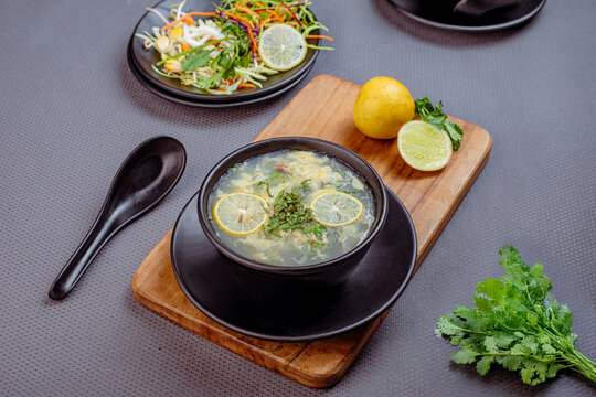 Light and flavorful chicken lemon coriander soup prepared with tender chicken, fresh coriander leaves, and a hint of lemon. A healthy and comforting Asian-style soup known for its refreshing taste, id