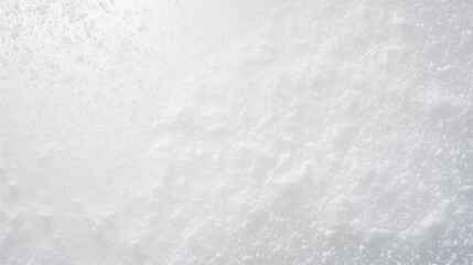 Fototapeta premium Top-down macro photo of fine snow surface, soft sparkling texture