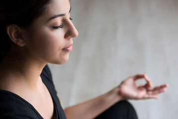 young woman doing yoga