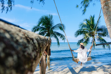 Swinging into tranquility on the serene beaches of Koh Kood Island, Thailand