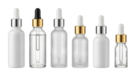 Collection of six minimalist glass dropper bottles with white and gold accents isolated on