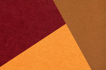 Fototapeta premium Geometric dark red, orange and brown texture paper background for presentation, banner or card design template