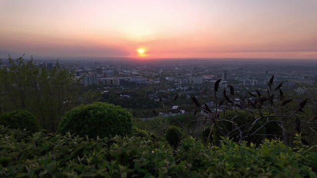Almaty, Kazakhstan: Panoramic footage of the sunset over Almaty city from the Kok Tobe hill  in Kazakhstan largest city in Central Asia