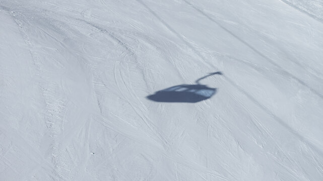 An snowy snow - ice surface as an mountain ski descent. Winter sports texture.