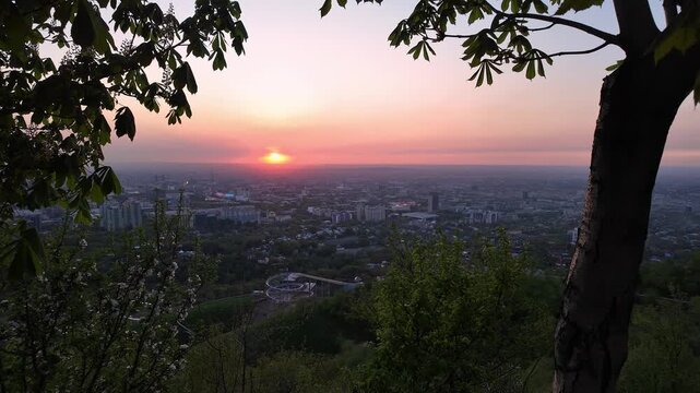 Almaty, Kazakhstan: Panoramic footage of the sunset over Almaty city from the Kok Tobe hill  in Kazakhstan largest city in Central Asia