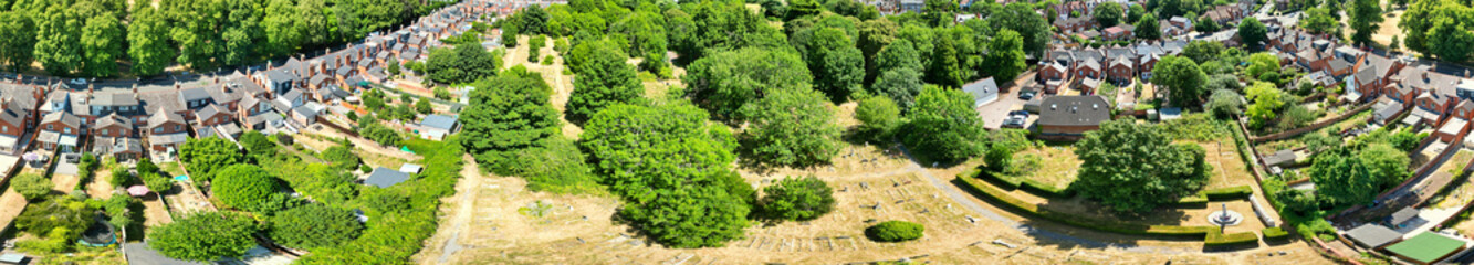 Fototapeta premium High Angle Ultra Wide Panoramic View of Iconic Buildings at Central Reading London City and Town Centre. Aerial Drone Tour of England United Kingdom. July 11th, 2025