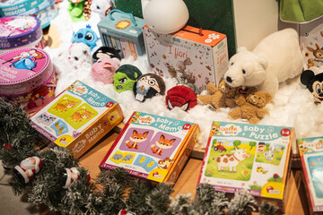 Obraz premium Christmas gifts display presenting children's plush toys and board games