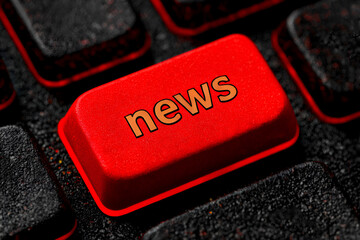 Computer keyboard with red news button