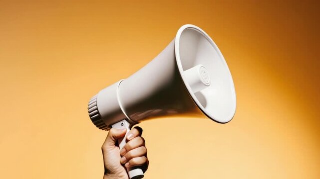 Hand Holding Megaphone for Announcements, Protest, and Public Speaking