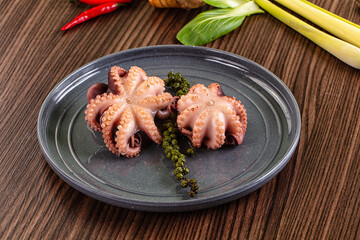 Gourmet Boiled octopus in the bowl © Andrei Starostin