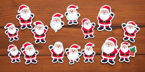 Variety of festive Santa Claus stickers on a wood background, holiday, cute