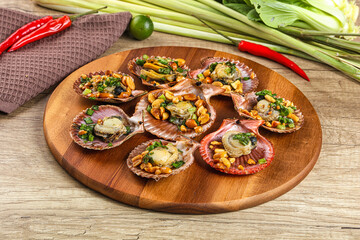 Baked scallops with scalion oil