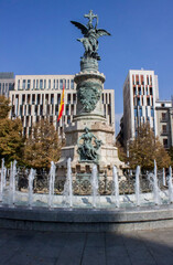 A decorative fountain with sculptures in the city of Zaragoza