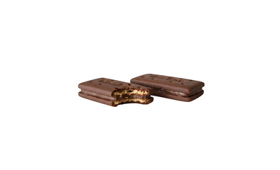 Famous Aussie chocolate biscuit with a bite missing on a white bench

