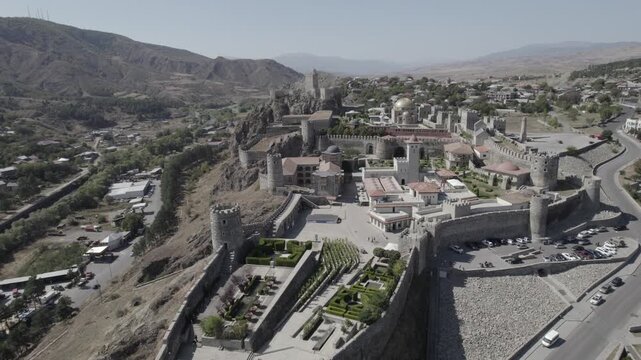 Aerial view of Rabati Castle, a medieval fortified complex in Akhaltsikhe, Georgia, featuring historic stone walls and towers set within the mountainous Samtskhe Javakheti region