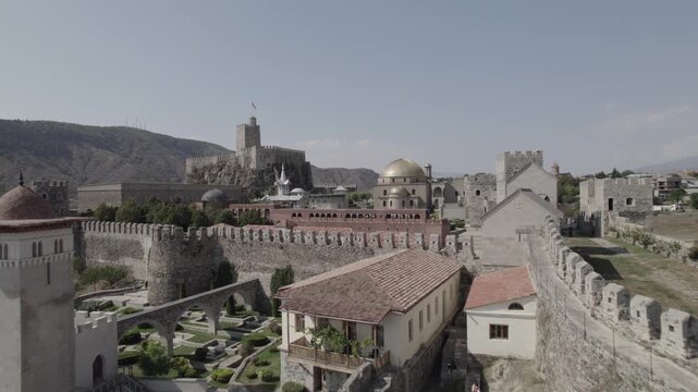 Aerial view of Rabati Castle, a medieval fortified complex in Akhaltsikhe, Georgia, featuring historic stone walls and towers set within the mountainous Samtskhe Javakheti region