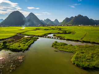 Aerial drone view of Bac Son rice field valley at sunset, Lang Son, Vietnam
