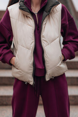 Women's everyday casual sport wear, beige puffer vest and violet sport set autumn-winter stylish woman's cloth © asauriet