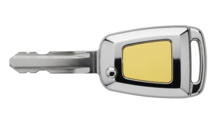 Isolated car key, silver and gold with a rectangular insert and ring, automotive accessory