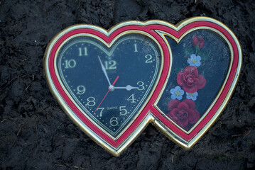Photo of broken heart shaped wall clock