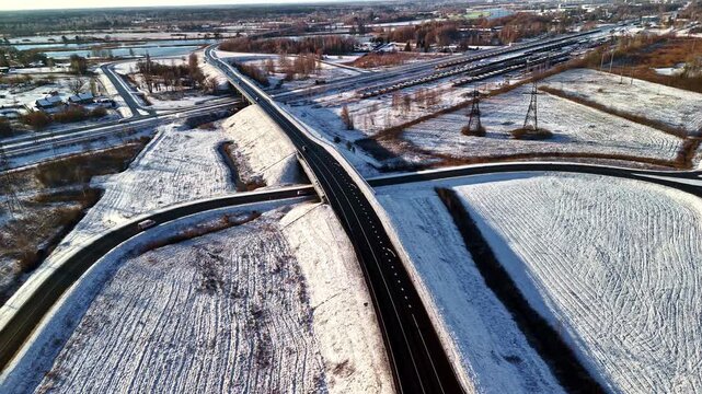 Snowy roads and fields in Jelgava, Latvia from an aerial view