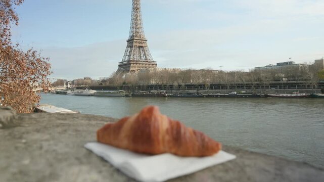 Paris France Eiffel Tower to Croissant Focus Pull on Seine River Bank